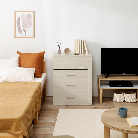 1台で収納、デスク、ドレッサーの3役を兼ねる多機能な収納家具が置いてある部屋