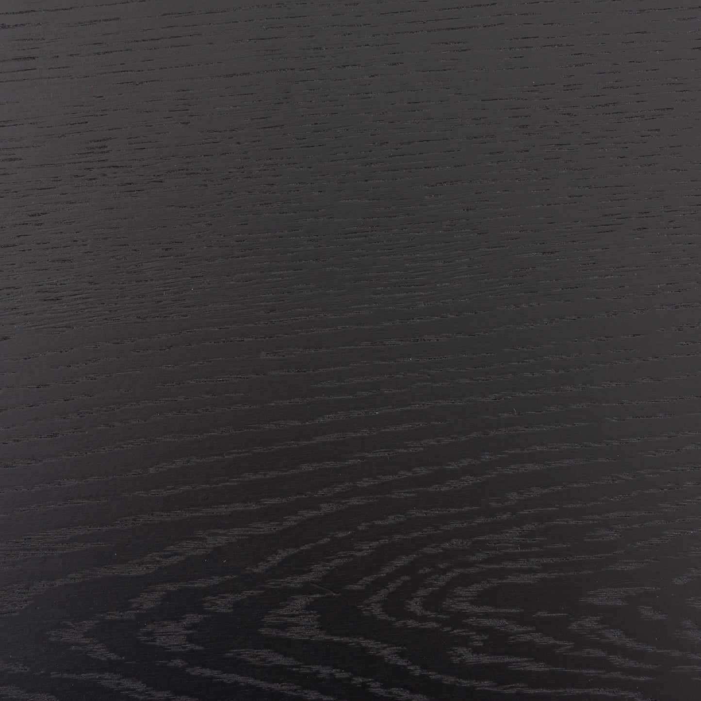 天然木オーク材を使用したシンプルなダイニングテーブルのブラックの天板のアップ