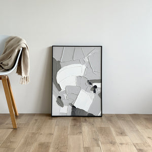 テクスチャーアートのモノクロームのモダン抽象画で、白とグレーの層状テクスチャーを持つ黒枠の絵画です。