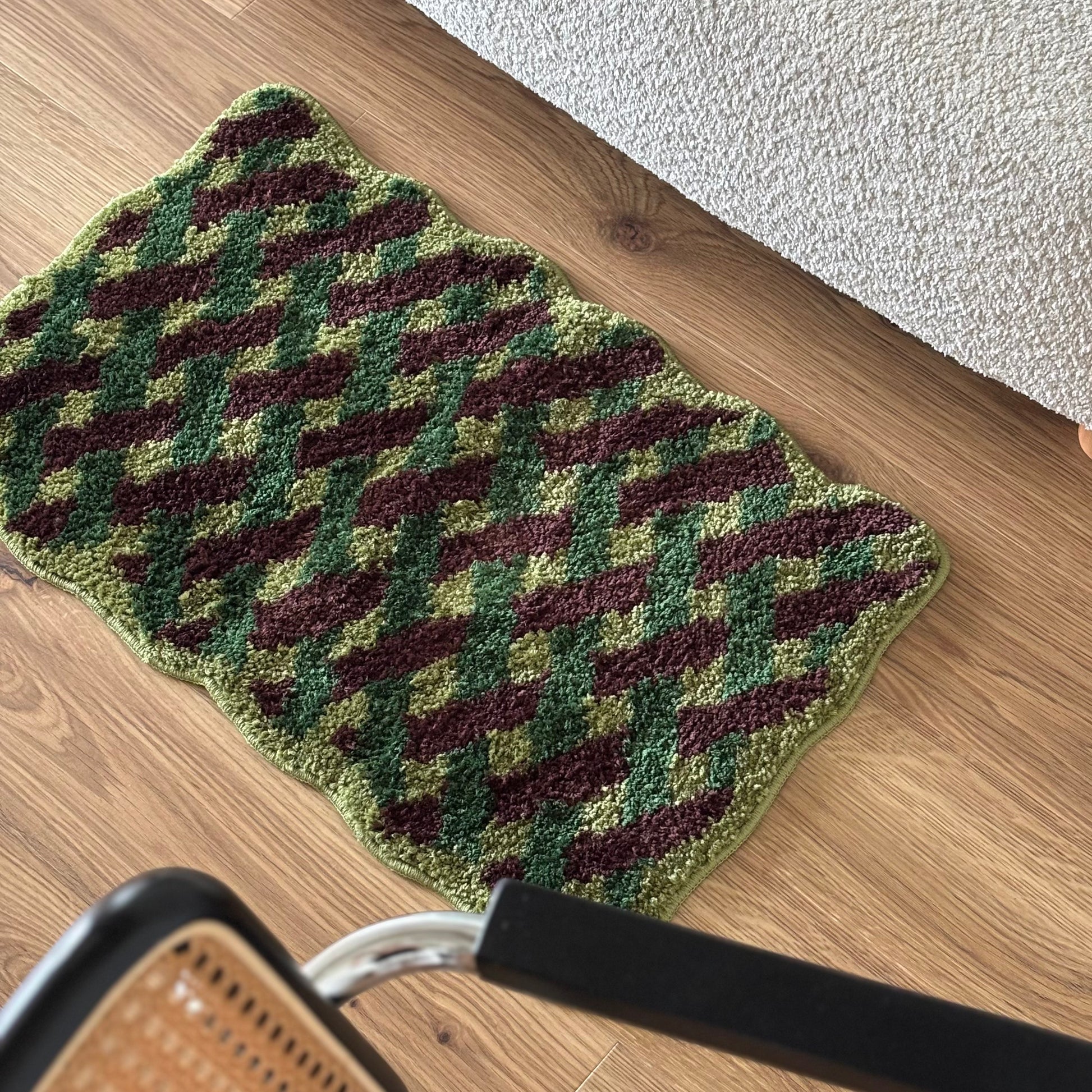 グリーンのウェーブクロス柄のミニラグ