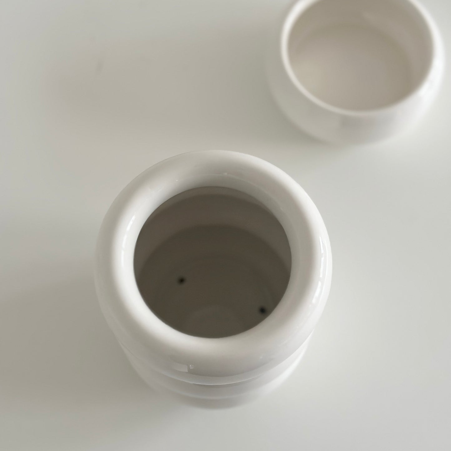白の丸いホルダーを上から撮った様子