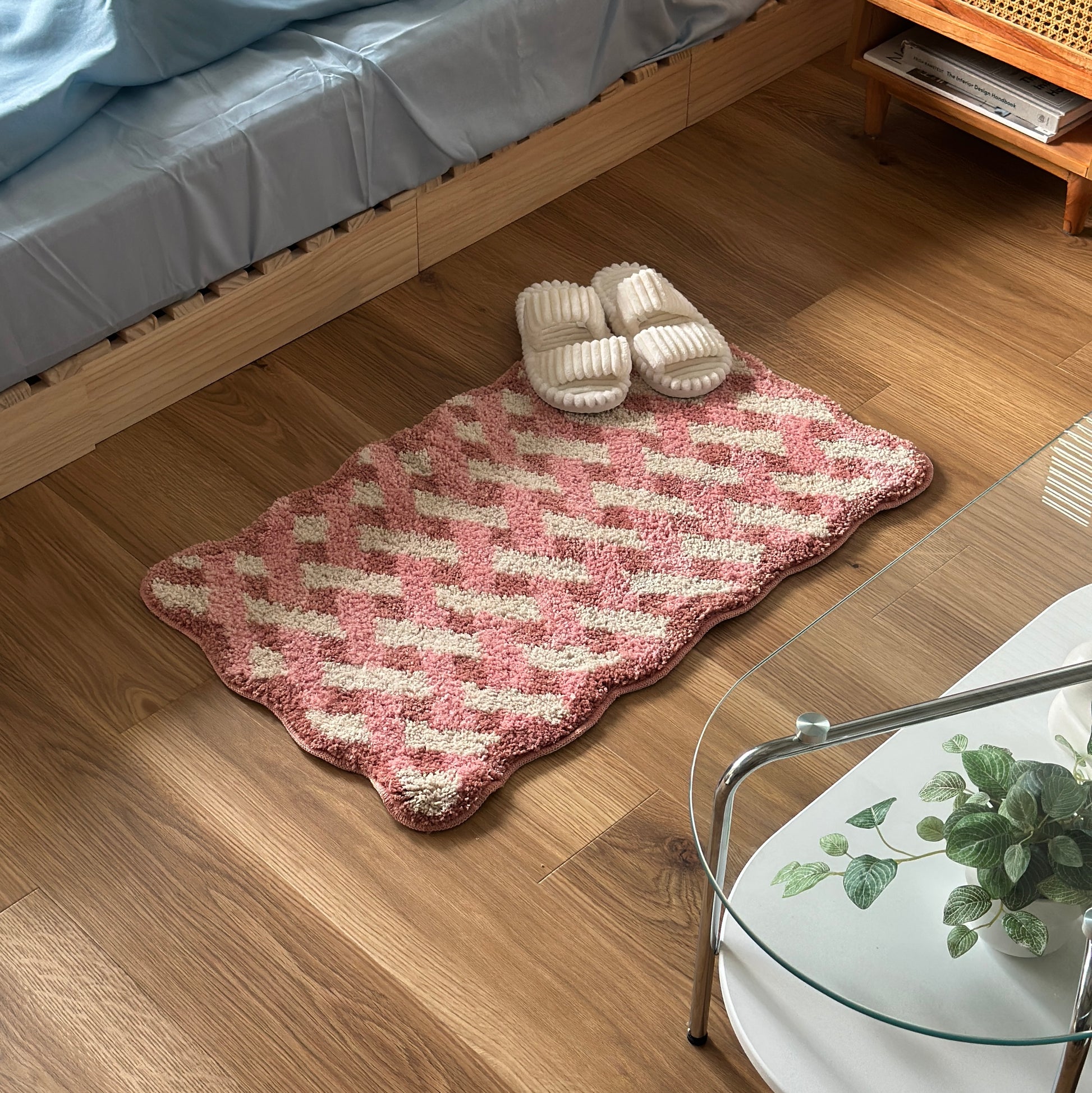 ピンクのウェーブクロス柄のミニラグ