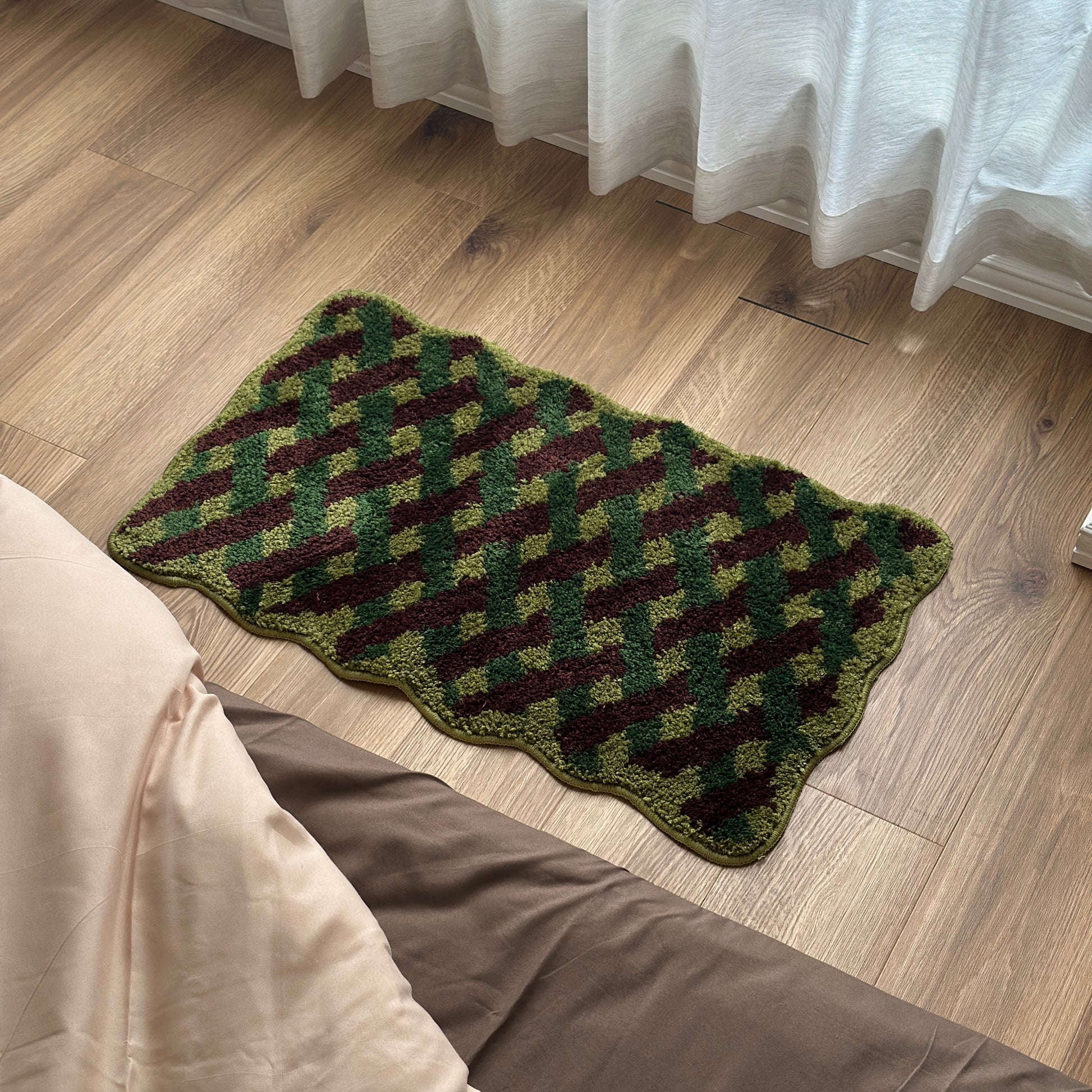 グリーンのウェーブクロス柄のミニラグ