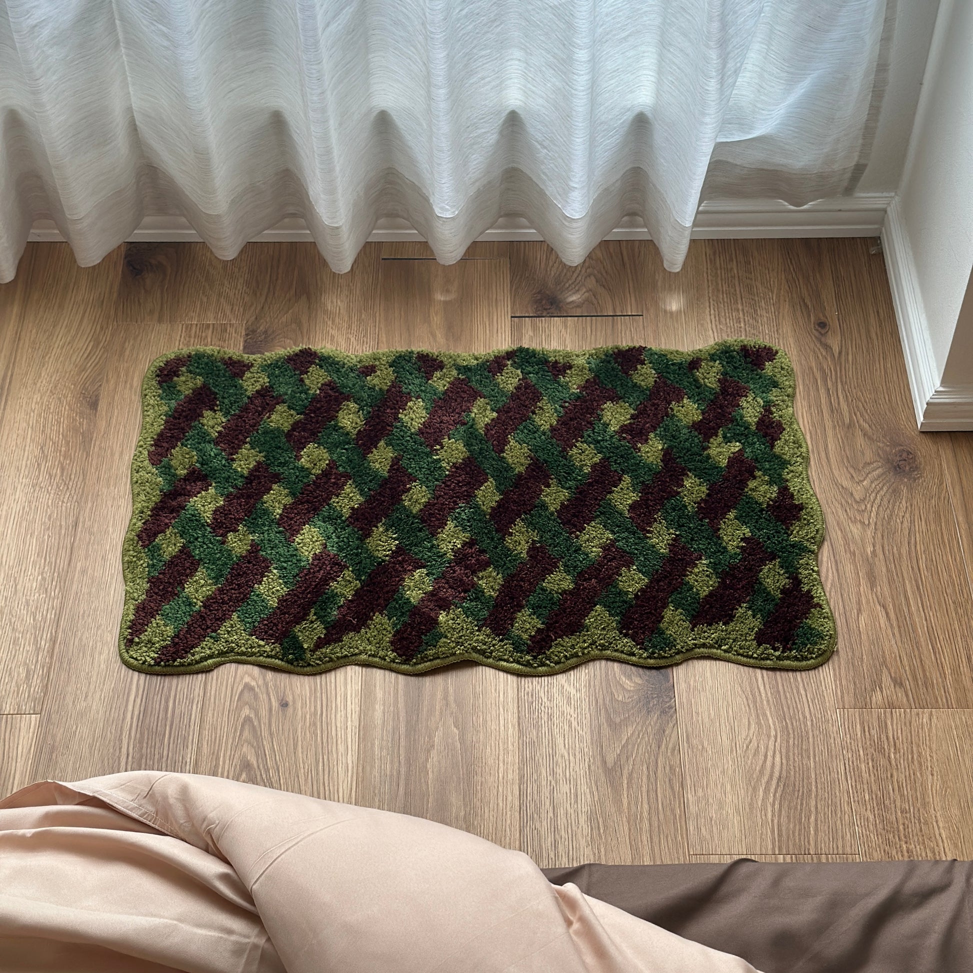 グリーンのウェーブクロス柄のミニラグ