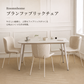 Roomnhomeのブランファブリックチェアクリーム色の布製ダイニングセット細身の白い金属製脚付き