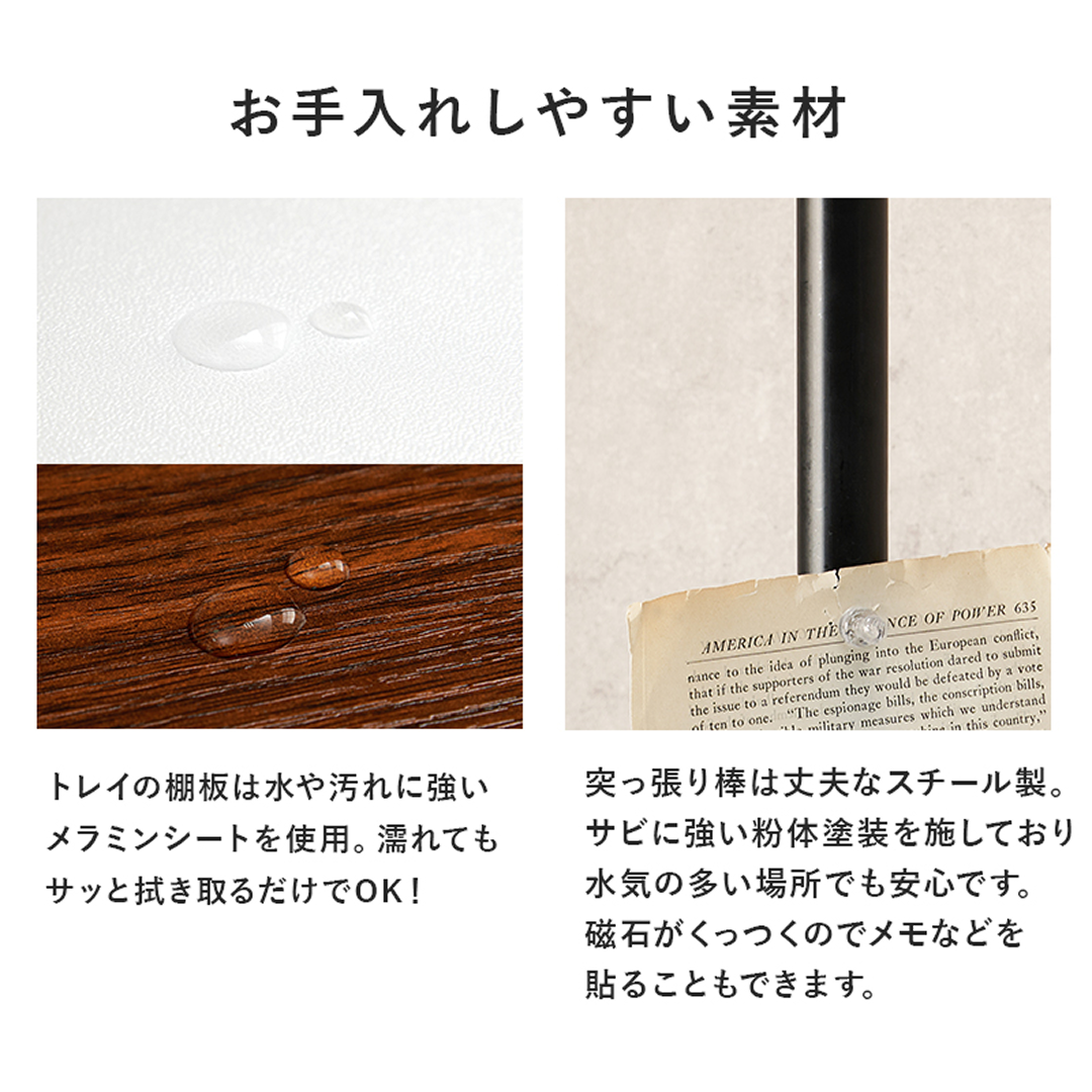 黒いスチール製の丸型突っ張りポールラックの脚に耐久性と磁気特性を示すヴィンテージ風ラベルが付いている