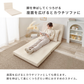 Beigeのクッション付きキルティングソファベッドで折りたたみ可能な背もたれ付きです。