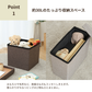 グレーの布製収納ボックスで黒い内張りとヒンジ付き蓋がある3wayテーブル付き収納スツール。
