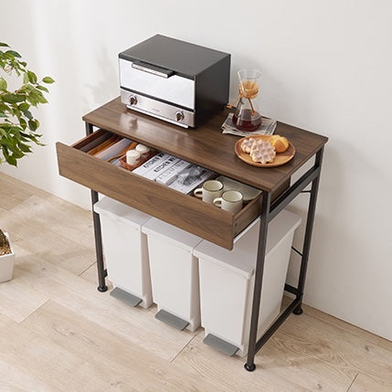 ブラウンのゴミ箱上収納の上にレンジが置かれている