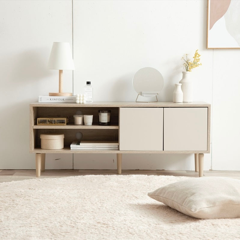 バイカラーのテレビボードのインテリアが飾られている