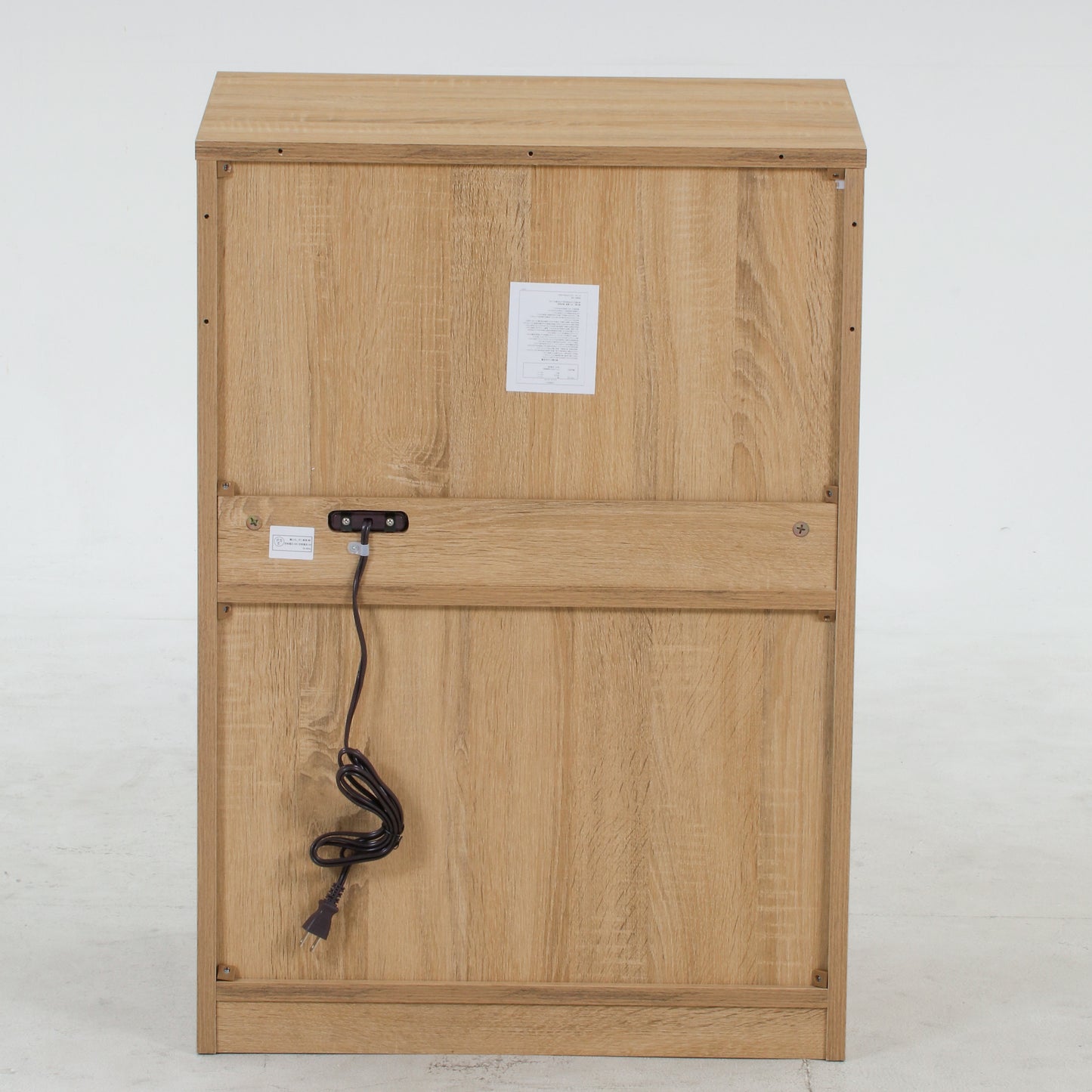 ユニット収納レンジボードナチュラルを背面からうつしている様子