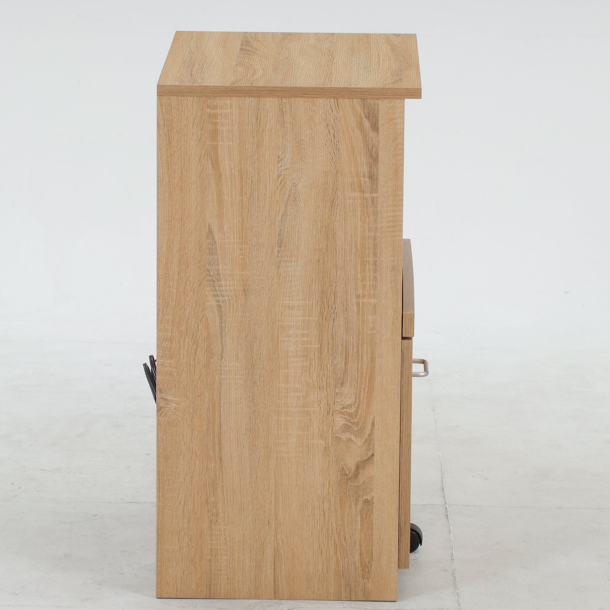 ユニット収納レンジボードナチュラルを側面からうつしている様子