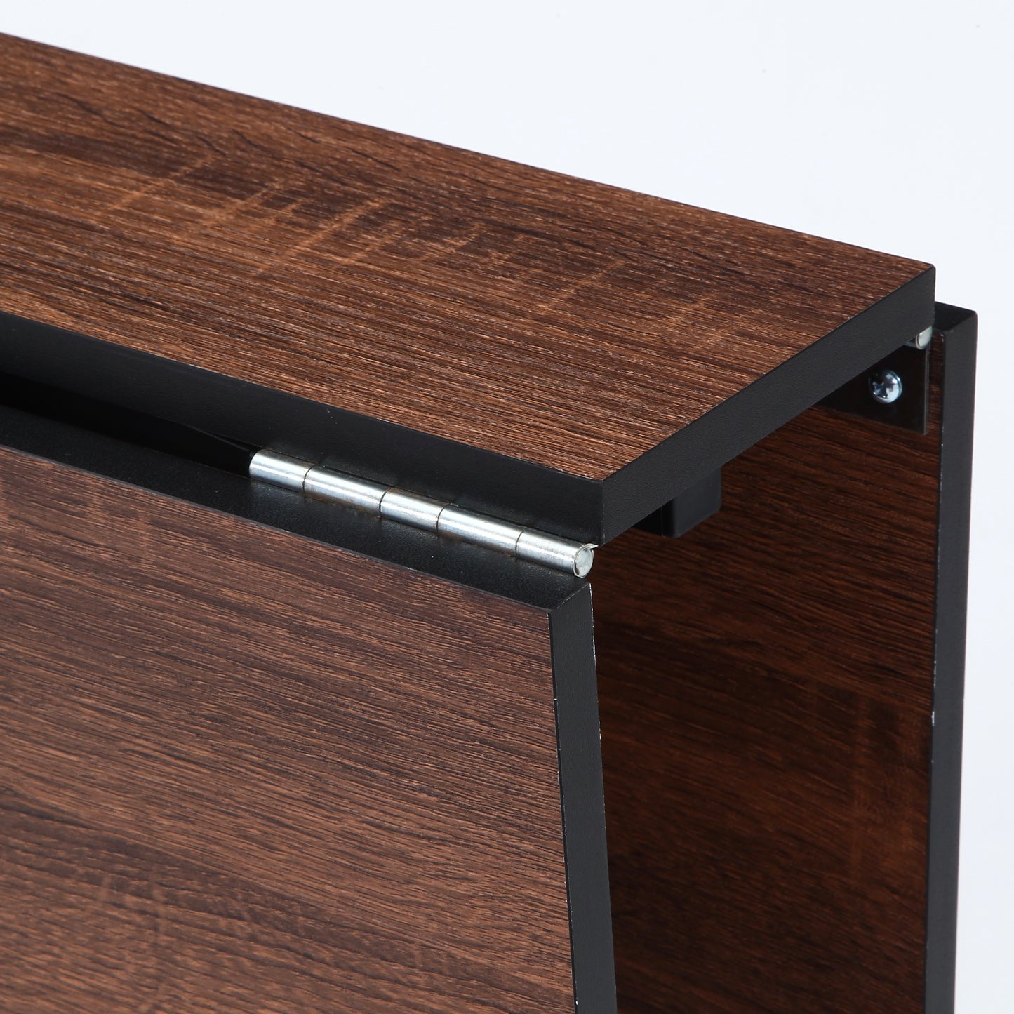 ウッド天板とスチール脚の異素材組み合わせの折りたたみ式のダイニングテーブルが折り畳まれている様子