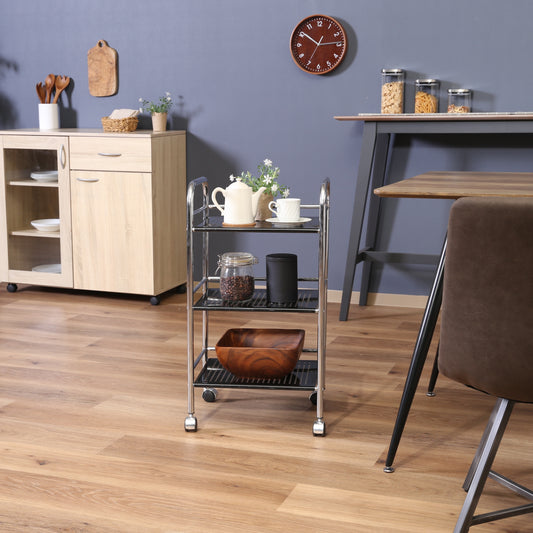 収納板がブラックのスチールワゴンに植物や食器、コーヒー豆が置かれてある様子