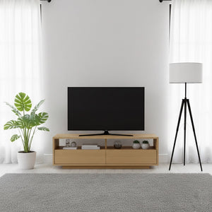 木目調の引き出し付きテレビボードを部屋に置いている様子