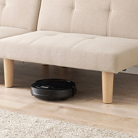 4wayで使えるリクライニング式のソファベッドの下をお掃除ロボットが通る様子