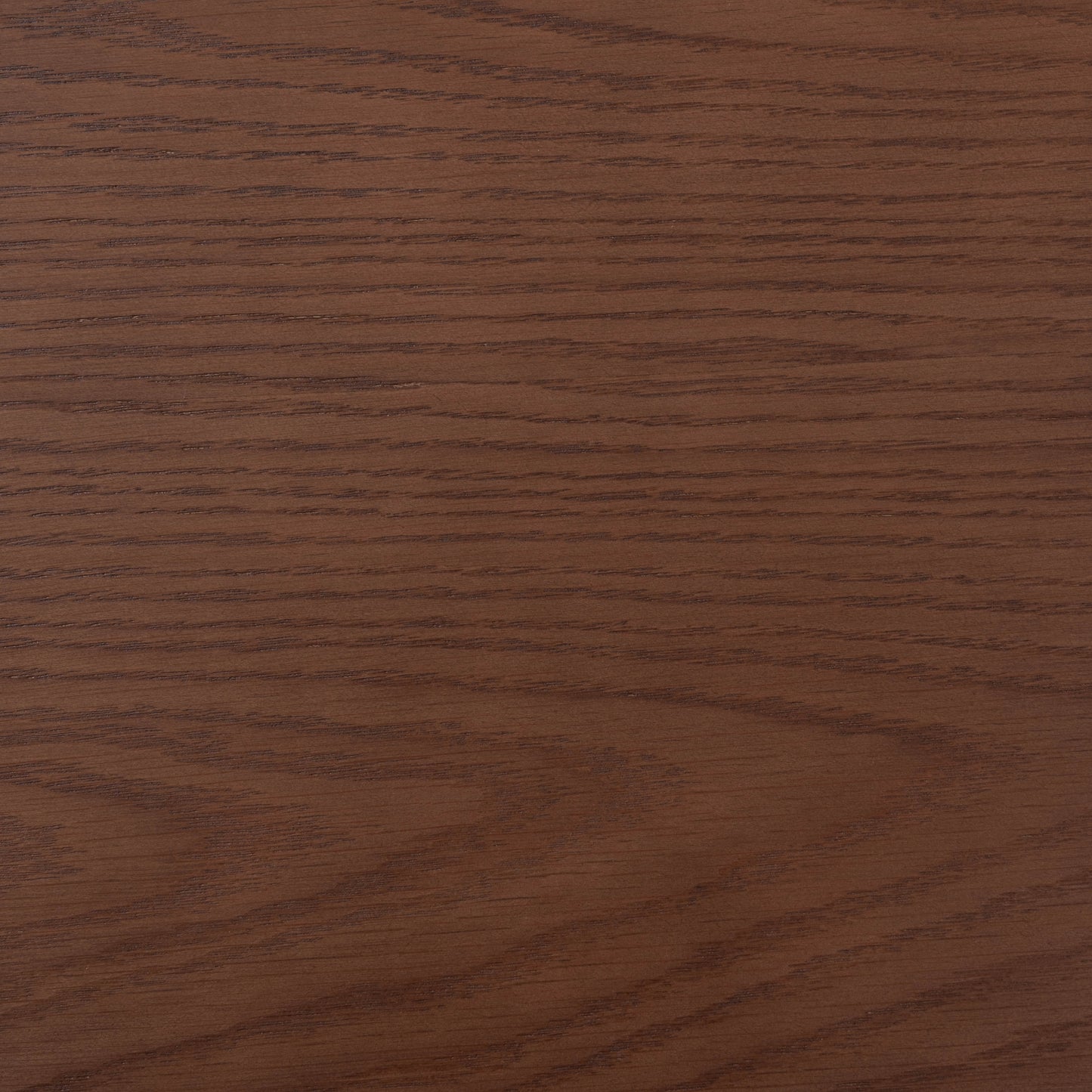 ウォルナットカラーの天然木の質感を生かした、シンプルな長方形のリビングテーブルの木目のアップ