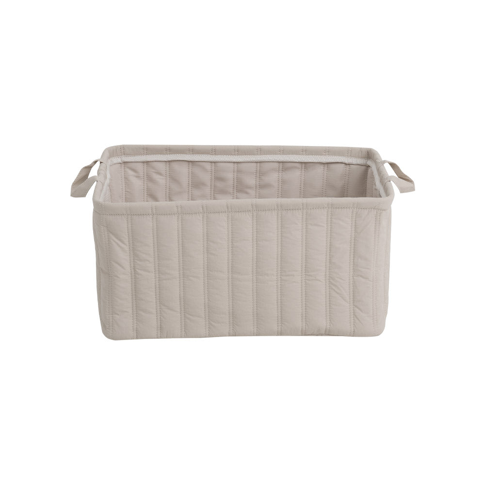 キルティング素材のベージュのバスケット