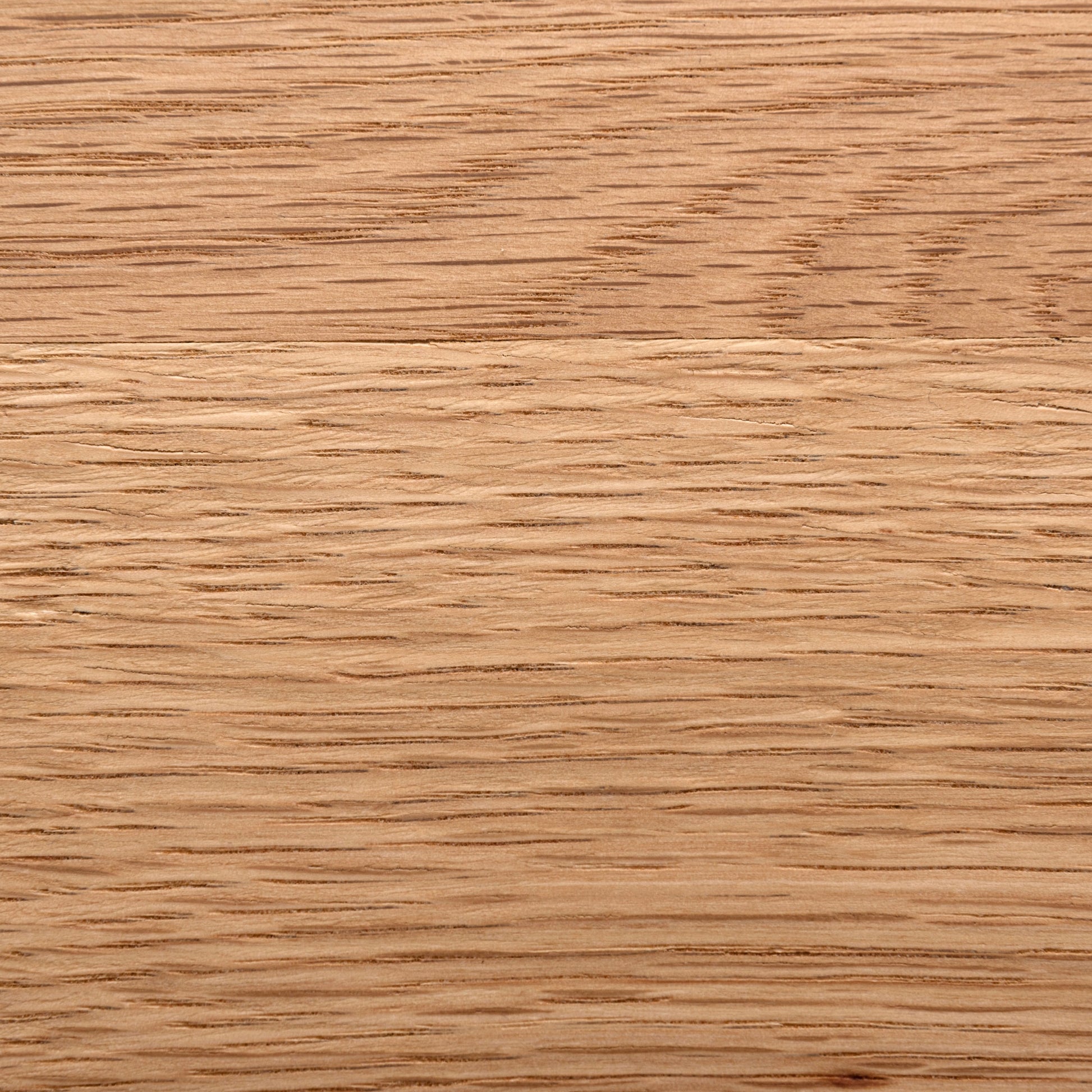 天然木の天板にテラゾー柄のスチール脚を組み合わせた、異素材ミックスデザインのダイニングテーブルの天板の木目のアップ