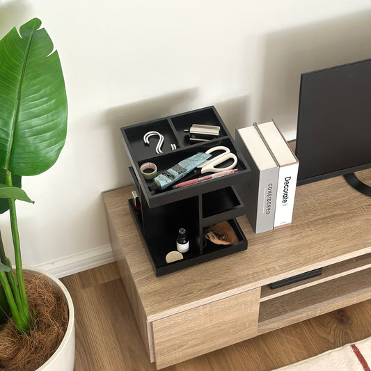 ウッド素材のブラックの回転式のラックをテレビ台に置いている様子