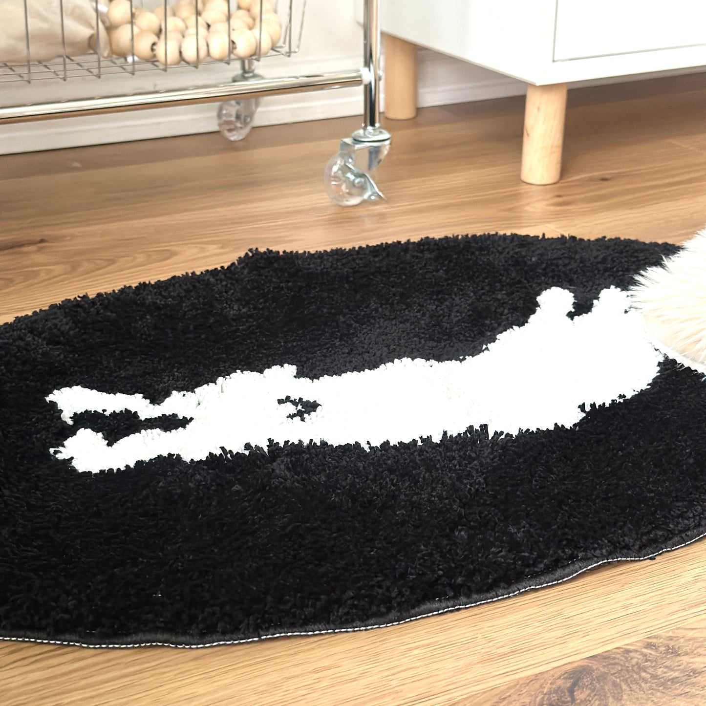 眠る犬がイラストされたミニラグ