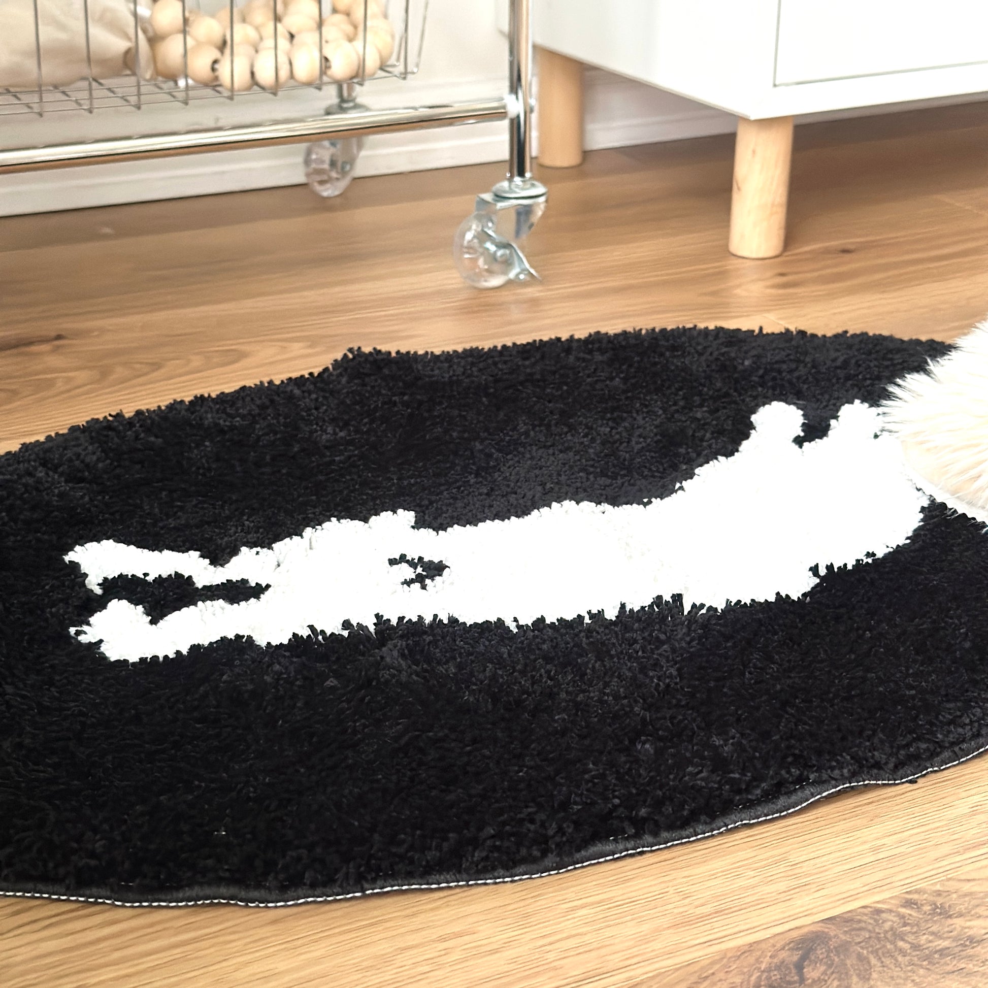 眠る犬がイラストされたミニラグ