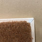 タフティングアートの茶色いコイヤーマット白いプラスチック枠付き
