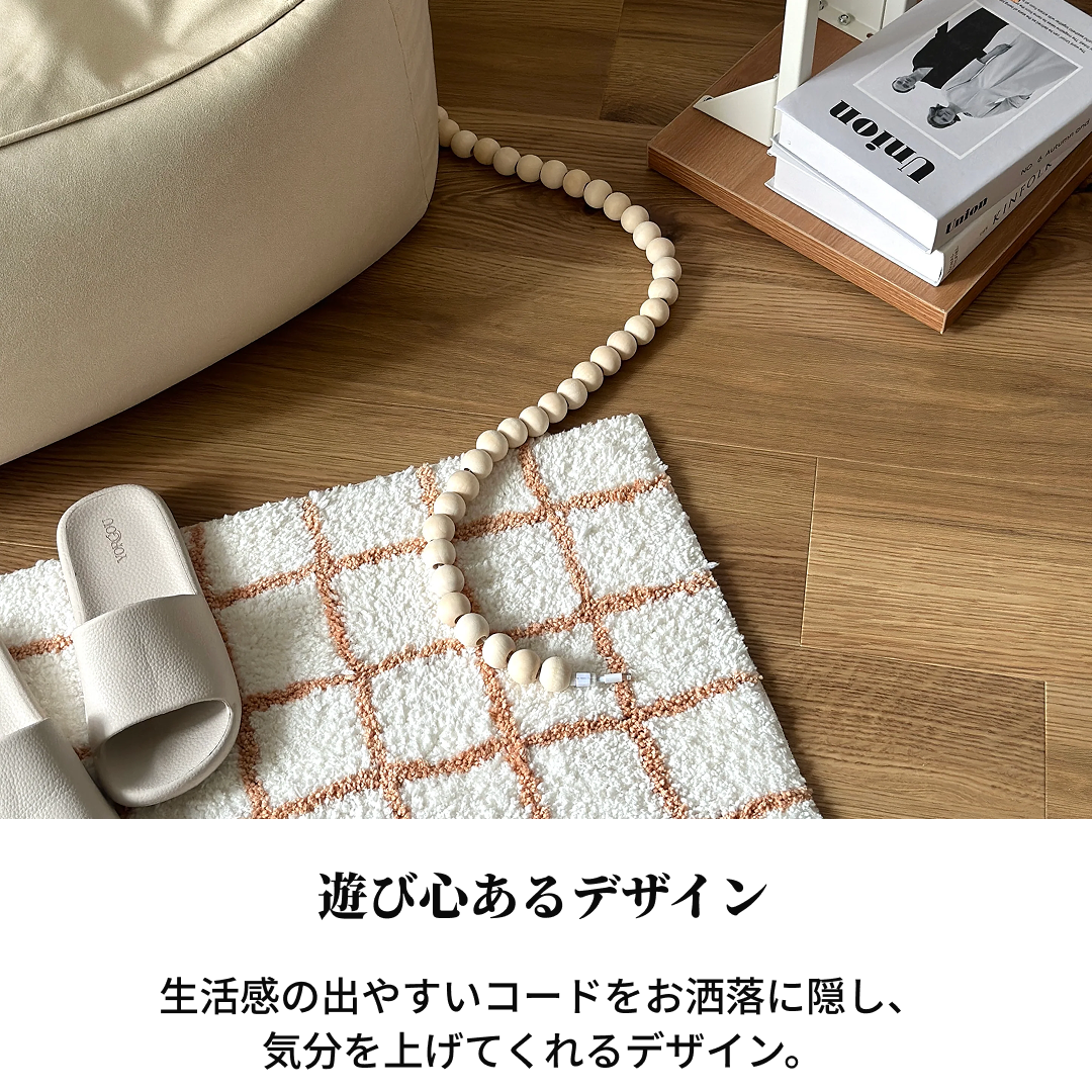 ウッドコードカバーのクリーム色テクスチャー入りライトピーチ色の編み格子柄ラグ
